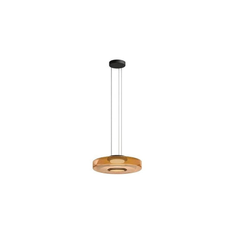 "A single amber glass disc pendant light."
