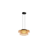 "An amber glass disc pendant light with tiered design."