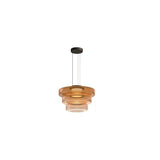 "A modern glass disc pendant light with tiered design."