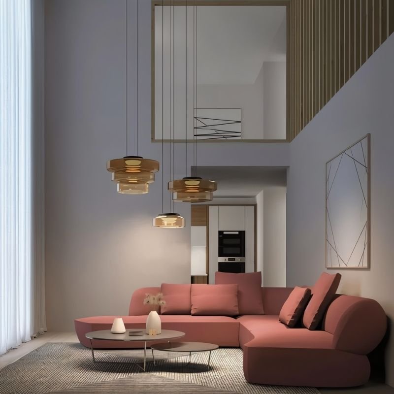 "Multiple glass disc pendant lights in a modern living room."