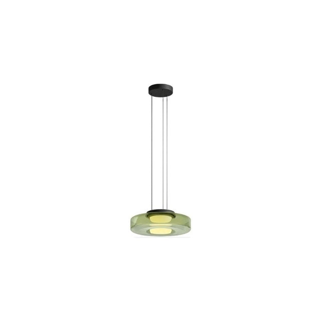 "A single green glass disc pendant light."