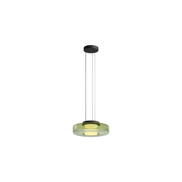 "A single green glass disc pendant light."