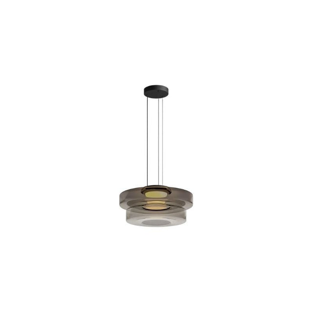 "A grey glass disc pendant light with tiered design."