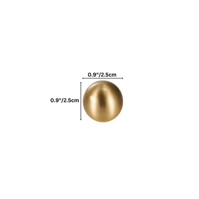 "Dimensions of a gold brass knob with spherical design: 0.9 inches (2.5 cm) in diameter."