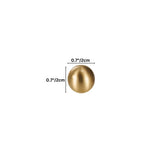 "Dimensions of a gold brass knob with spherical design: 0.7 inches (2 cm) in diameter."