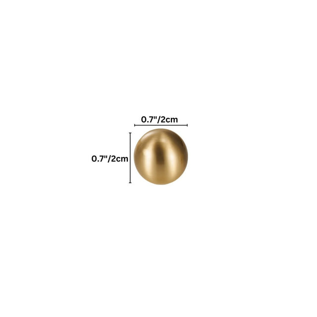 "Dimensions of a gold brass knob with spherical design: 0.7 inches (2 cm) in diameter."