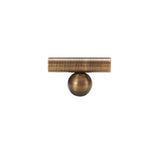 "Bronze brass knob and pull bar with cylindrical design, isolated on a white background."