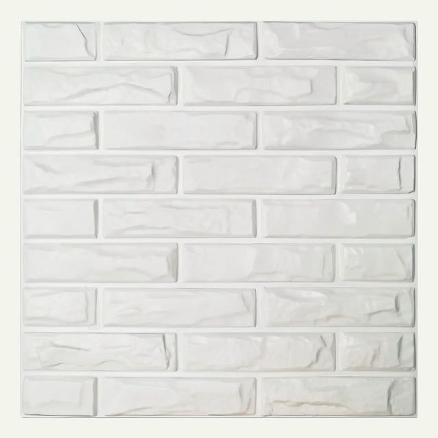 Close-up of a single Libtu Wall Panel with 3D white brick pattern, ideal for DIY PVC wall panel installations.