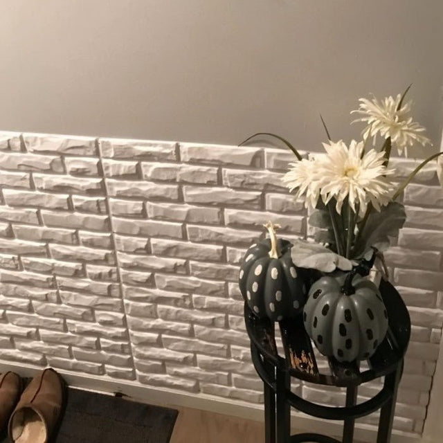 Decorative hallway featuring Libtu Wall Panel with white 3D brick texture, enhancing interior style with PVC wall panels.