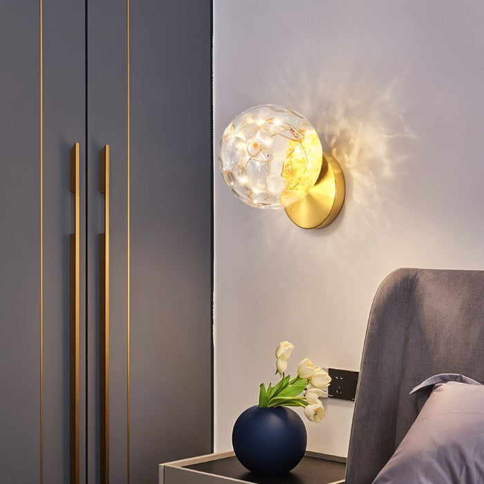 Linda Wall Lamp with brass finish give off modern lighting for your bedroom