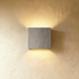Square white ceramic tile with 3.9" sides next to rectangular tile sample 2" wide on white background.