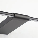 "Close-up detail of the black metal and PC construction of the Lisorva wall lamp, highlighting its minimalist design and functionality."