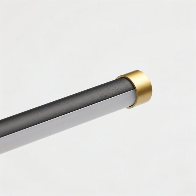 "Close-up detail of the brass accents on the minimalist Lisorva wall lamp, highlighting its sleek design and construction from metal and PC."