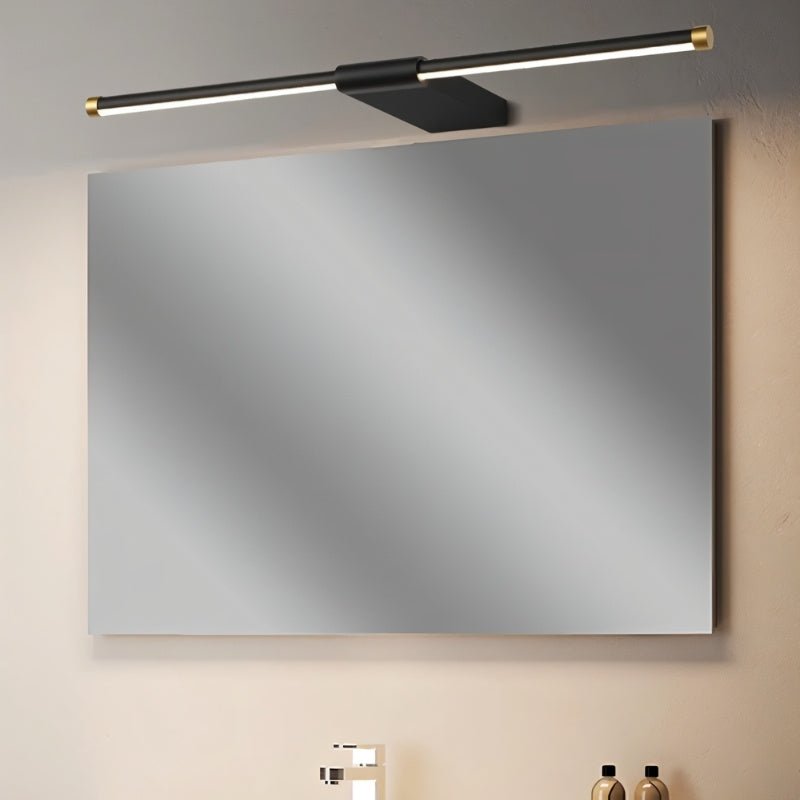 "Modern and minimalist Lisorva wall lamp in black metal and PC with brass accents, providing even illumination above a bathroom vanity."