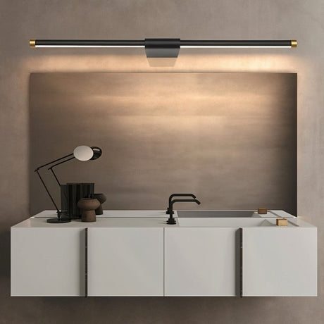 "Modern minimalist Lisorva wall lamp in black metal and PC with brass accents, providing even illumination above a bathroom vanity mirror."