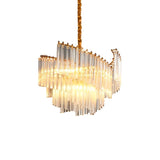 "A tiered chandelier with clear crystal rods and a brass frame, isolated against a pure white backdrop."