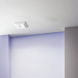"Square recessed downlight made from gypsum and aluminum with ribbed edges, providing glare-free illumination in modern, contemporary interiors like kitchens and offices."