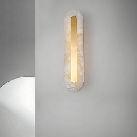 "elegant alabaster and brass wall lamp with soft natural texture and warm glow"