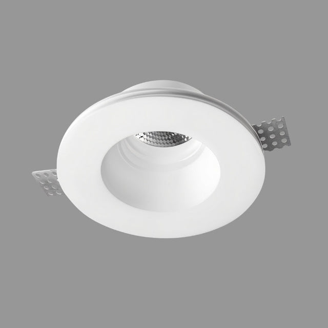"Loux Trimless Downlight fixture close-up, made from gypsum and aluminum, featuring seamless ceiling integration with a clean, minimalist design."