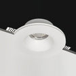 "Close-up of Loux Trimless Downlight, featuring a minimalist design made of gypsum and aluminum, seamlessly integrated into the ceiling for a clean, unobtrusive look."