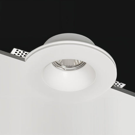 "Close-up of Loux Trimless Downlight, featuring a minimalist design made of gypsum and aluminum, seamlessly integrated into the ceiling for a clean, unobtrusive look."