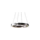 "A modern, circular chandelier with a segmented ring design and unique textured pattern, made of iron and glass, suspended by thin cables."