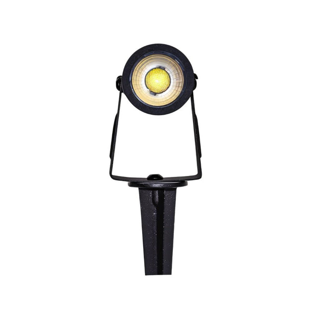 "Front view of an outdoor spotlight with spike mount, aluminum body, and adjustable head."