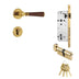 Brass door handle with wood grip, mortise lock mechanism, cylinder, and keys displayed on white background.