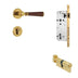 # Brass door handle set with mortise lock, cylinder, and wooden lever on white background.