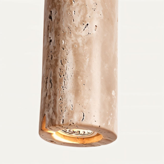 Detail view of Marus Pendant Light - Open Box | Sleek Travertine Fixture with visible bulb and polished travertine finish.