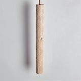 Close-up of Marus Pendant Light - Open Box | Sleek Travertine Fixture showing natural stone texture and cylindrical shape.