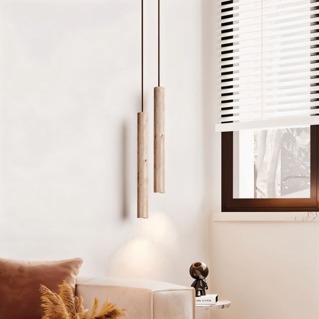 Marus Pendant Light - Open Box | Sleek Travertine Fixture in a modern living room with minimalist decor and ambient lighting.