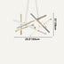 Modern geometric chandelier with mixed metal finishes in gold, silver, and white, suspended against a neutral background.