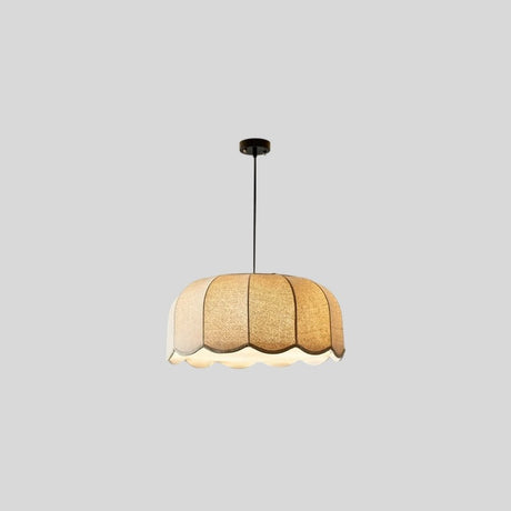 "Mashi pendant light with a fabric shade, isolated on a light grey background."