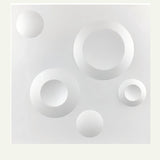 Masue Wall Panel featuring a modern 3D circular design in white PVC, ideal for stylish interior wall decoration and home improvement projects.