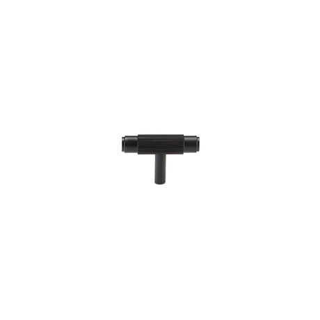 "Modern black brass knurled T-bar knob on a white background."