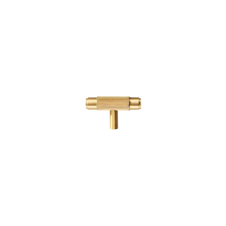 "Modern gold brass knurled T-bar knob on a white background."