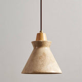 Close-up of Menra Pendant Light with flared travertine shade and wooden top, ideal for modern or rustic home lighting.