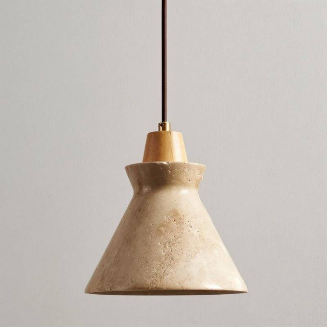Close-up of Menra Pendant Light with flared travertine shade and wooden top, ideal for modern or rustic home lighting.