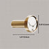 Brass cabinet knob with white marble face detail, shown against neutral gray background with dimensions.