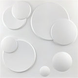 Close-up of Mundi Wall Panel showing 3D circular design in white PVC, ideal for decorative wall applications in residential or commercial spaces.