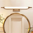 "A vintage-inspired LED wall lamp mounted above a round mirror."
