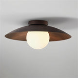"broad wooden shade top view, frosted glass globe center, natural wood texture, soft ambient light"
