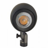 "Front view of an outdoor spotlight with LED light, adjustable features, and die-cast brass construction."