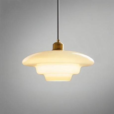 "Close-up of a single Niall pendant light with tiered design, crafted from durable metal and glass."