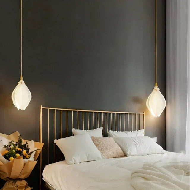 Nica Chandelier – Elegant Lighting for Modern Interiors with dual pendant lights over a bed, creating a serene and modern bedroom atmosphere.