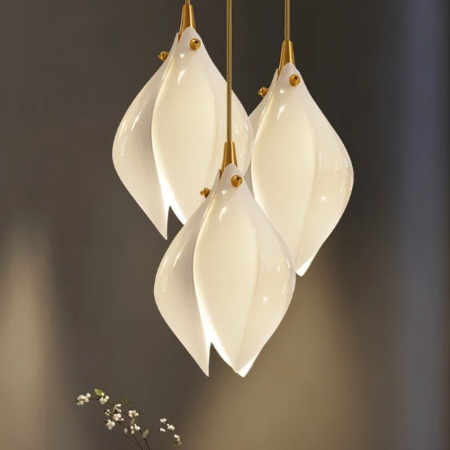 Nica Chandelier – Elegant Lighting for Modern Interiors featuring a close-up of clustered ceramic petals with gold accents, ideal for upscale interiors.