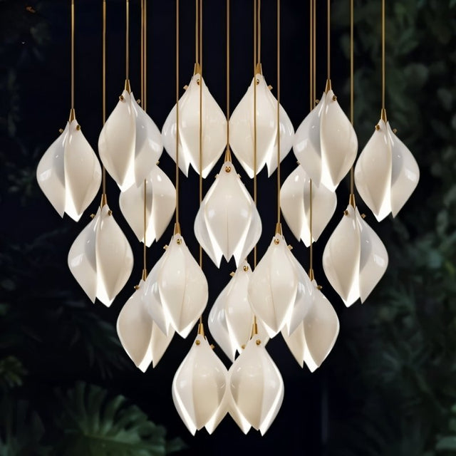 Nica Chandelier – Elegant Lighting for Modern Interiors with a dramatic cluster of petal-shaped lights, perfect for luxury stairwells or entryways.