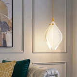 Nica Chandelier – Elegant Lighting for Modern Interiors featuring a single petal-shaped pendant in a chic living room, ideal for accent lighting.