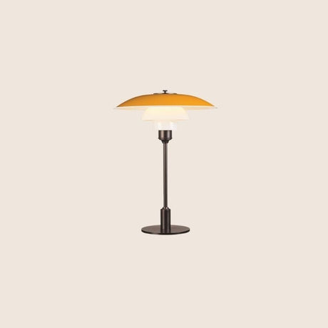 "Nisra Table Lamp with a vibrant yellow top shade and frosted glass diffuser, crafted from aluminum, iron, and glass for soft, ambient lighting in a minimalist design."